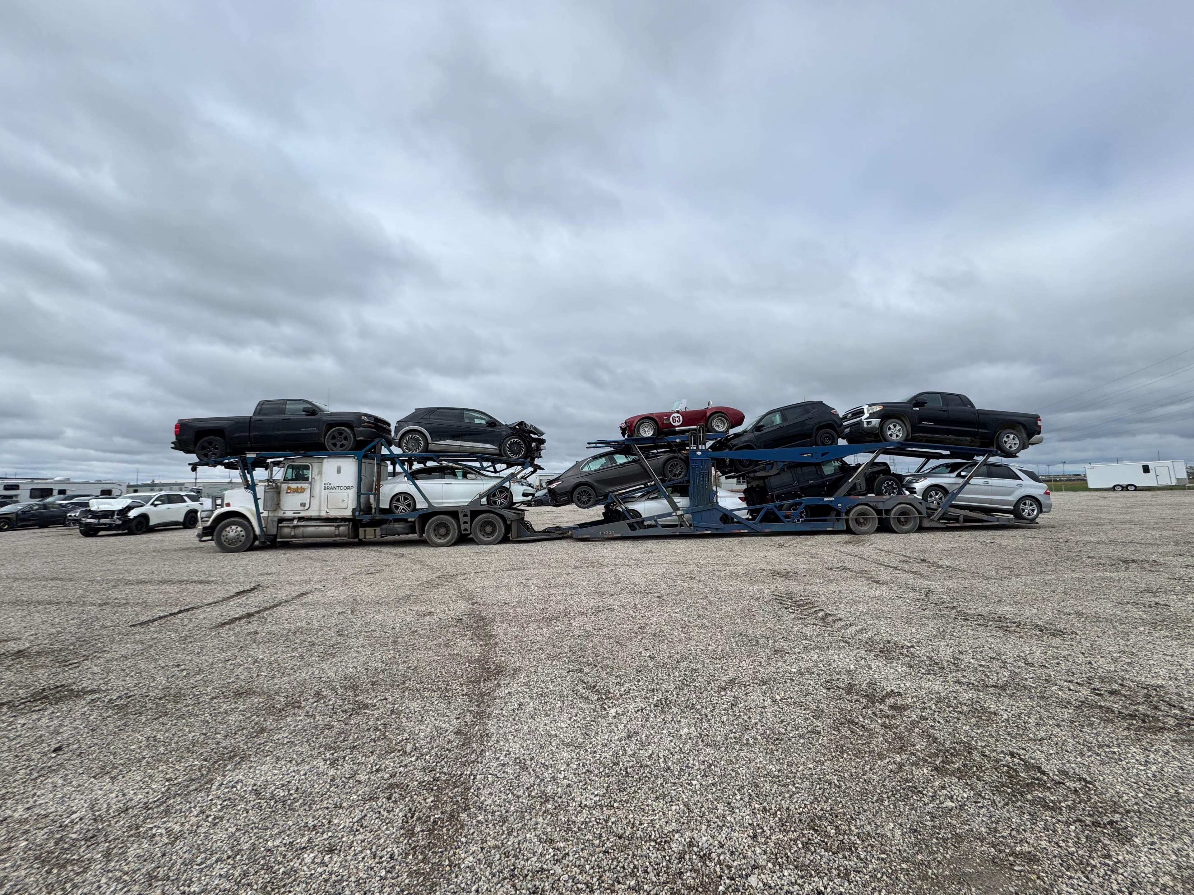 Prairie Auto Transport truck loaded with vehicles